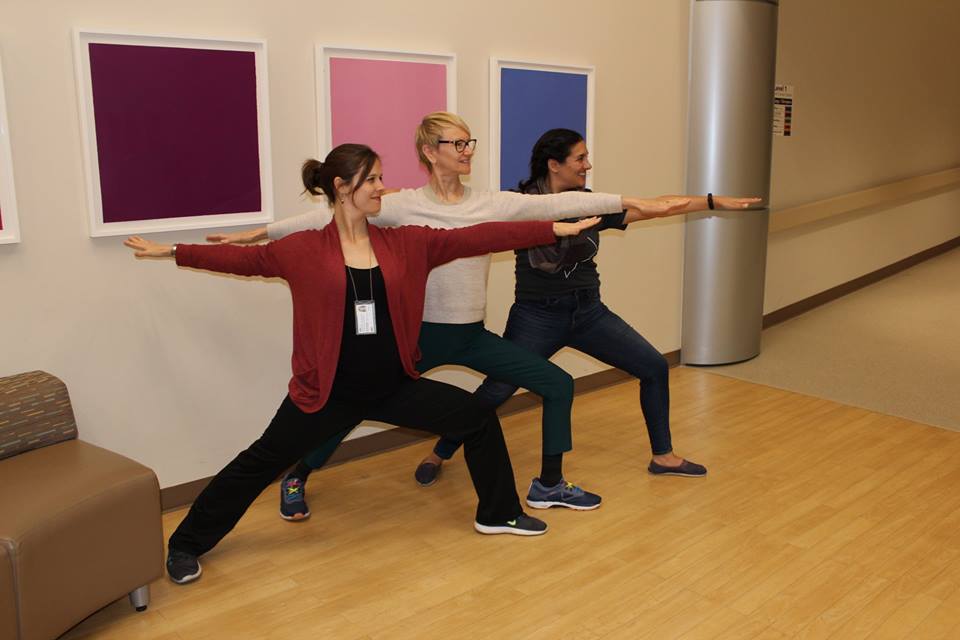 3 women in yoga pose
