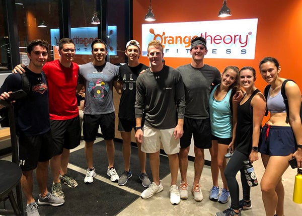 A group of people post-workout at Orangetheory Fitness