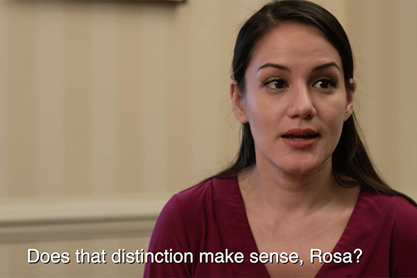 A woman speaking. Caption reads "Does that distinction make sense, Rosa?"