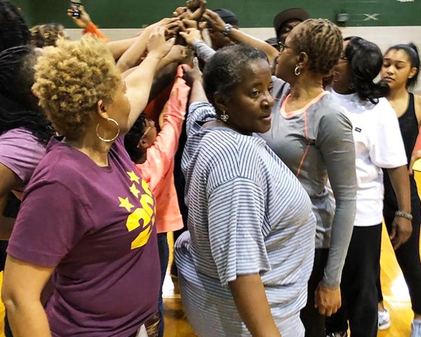 Women participate in an exercise class