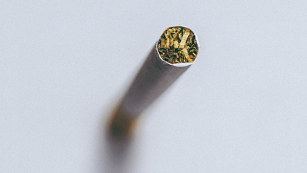 A cigarette pictured from one end