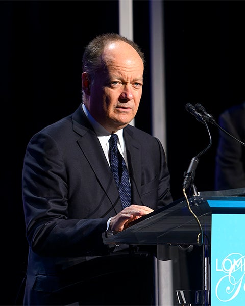 President DeGioia speaks at a podium