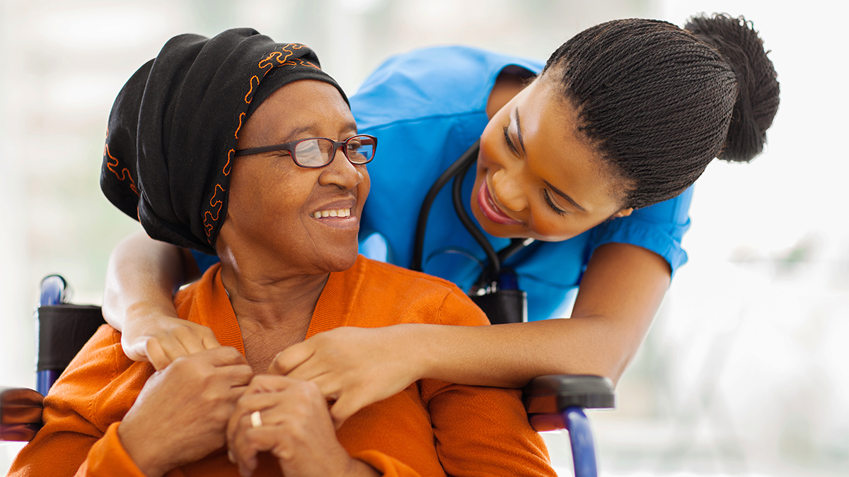 A nurse comforts a patient