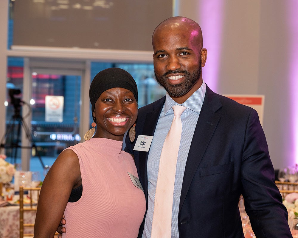 Alima and Dwight Draughton stand together at Lombardi Women