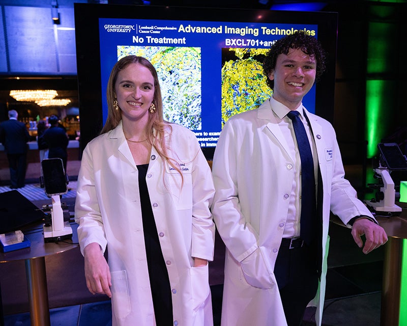 Rachael Maynard and Alex Lekan at the gala Mad Lab in their white coats