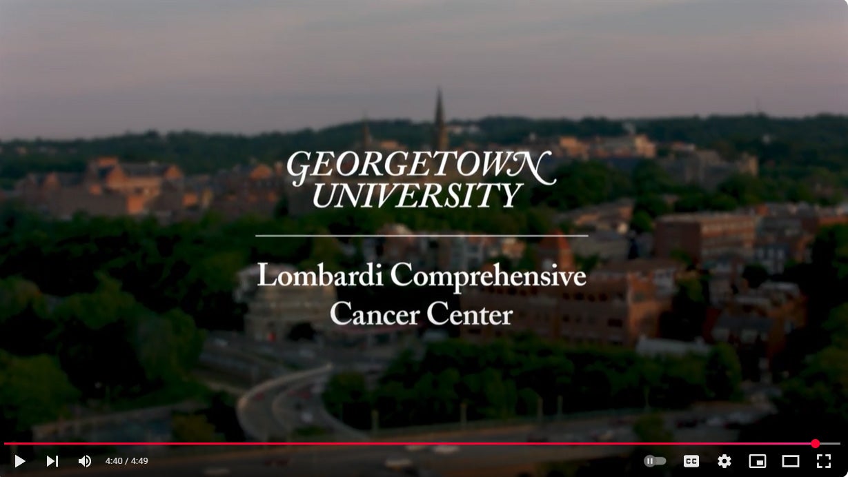 A screenshot from a video about the Ralph Lauren Center that displays an image of DC and the cancer center logo