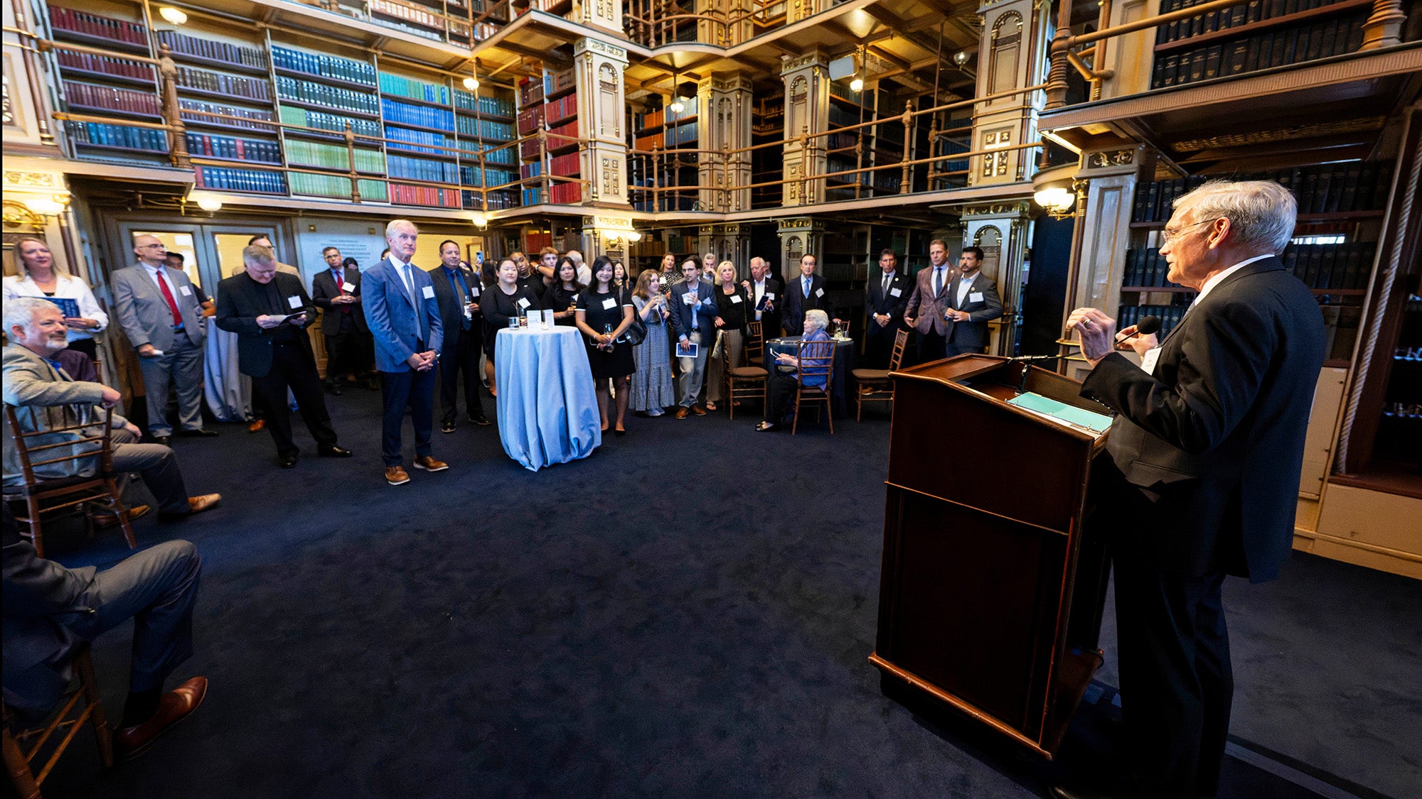 Robert M. Groves speaks to a group gathered in Riggs Library