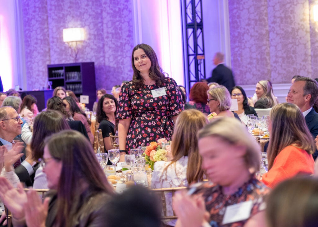 Claire Conley stands to be honored at the Lombardi Women gala