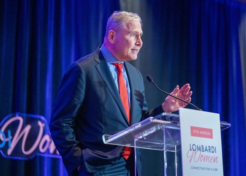 Dr. Weiner speaks from a podium during the event