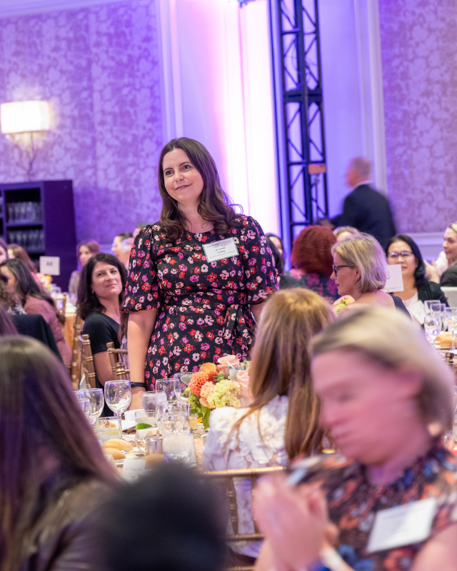 Dr. Claire Conley stands to be recognized at the Lombardi Women event