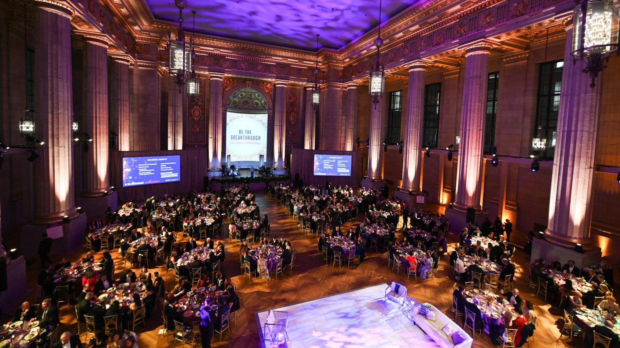 The Andrew Mellon Auditorium filled with tables and decorations for the Lombardi Gala