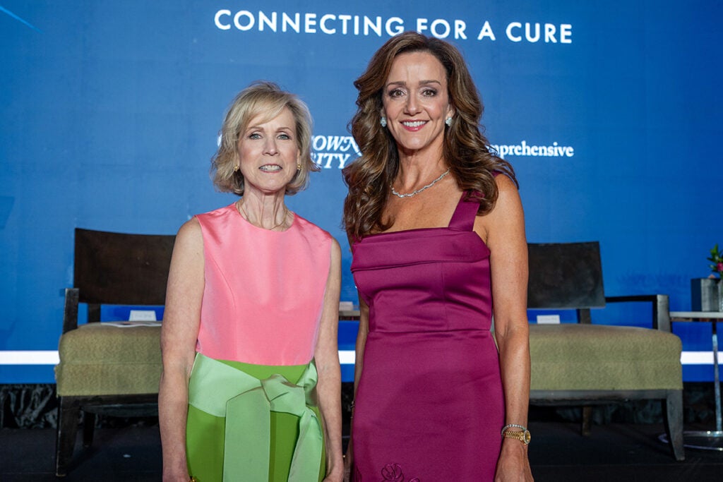 Two women stand together